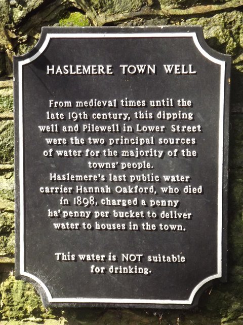 Haslemere town well wall with story about well